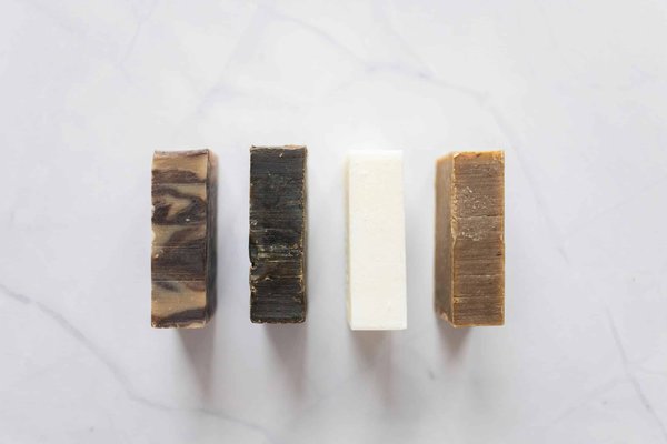 What specific steps are needed to form a UK-based artisanal soap making company that adheres to organic certification?
